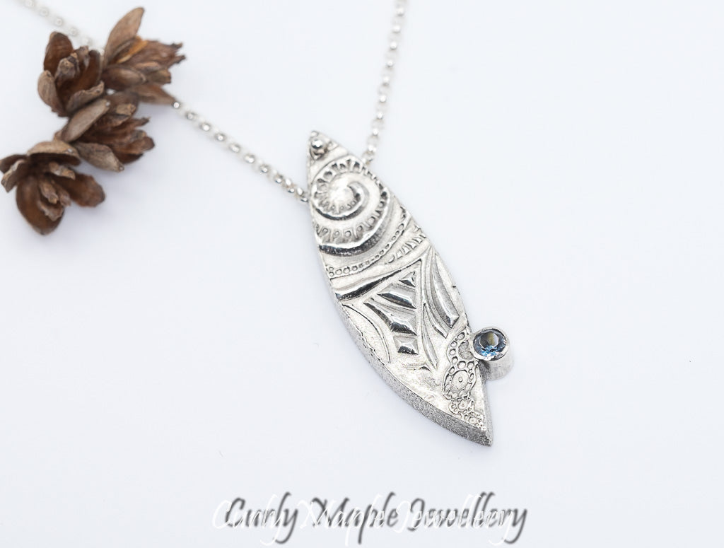 Blue Zircon Textured Silver Pod Necklace