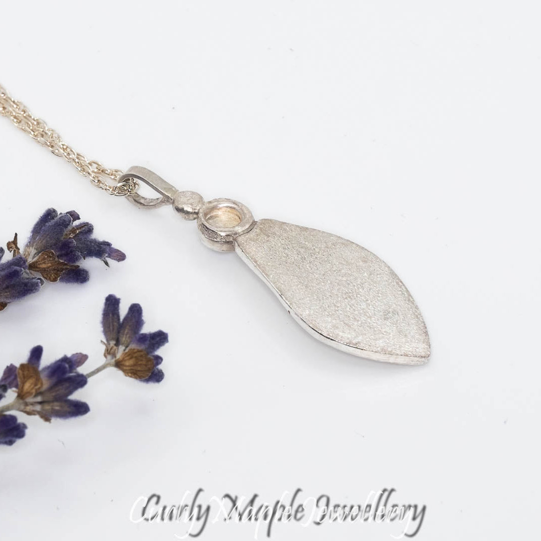 The back of the Silver Trillium Leaf Pearl Pendant