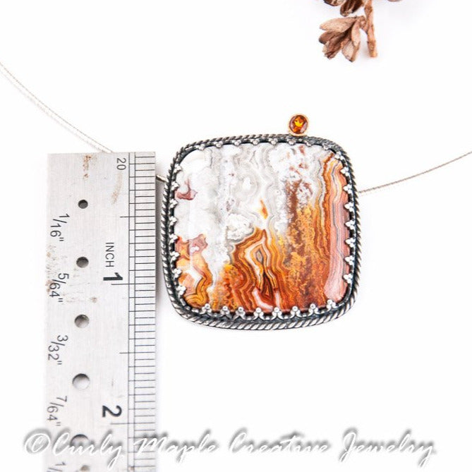 Fire Citrine Crazy Lace Agate Pendant Necklace in Sterling Silver with a ruler for scale