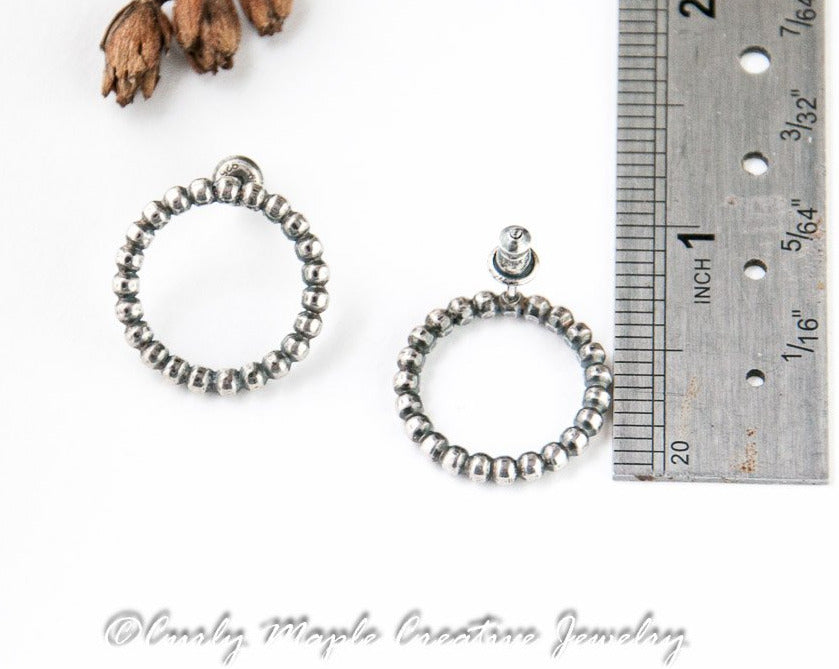 Open Circle Silver Beaded Wire Post Earrings with a ruler