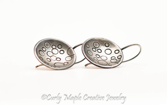 Bubble domed silver disc earrings