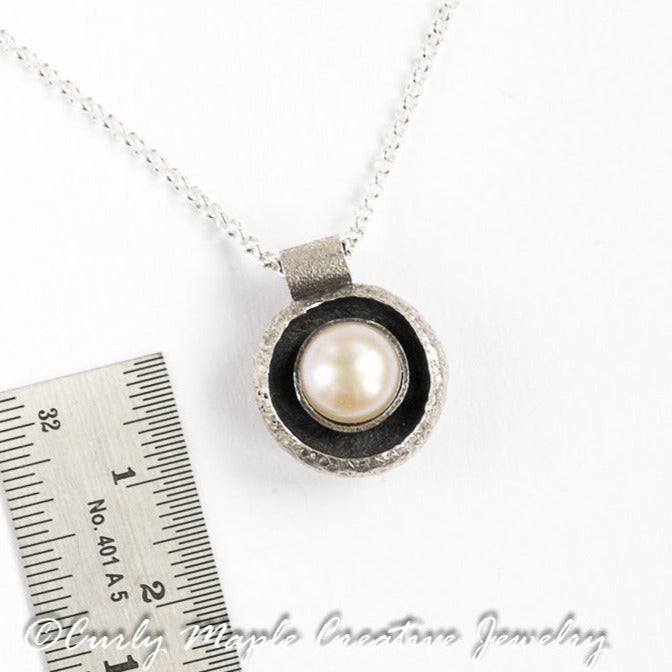 Organic Acorn Cap Pearl Pendant with a ruler for scale