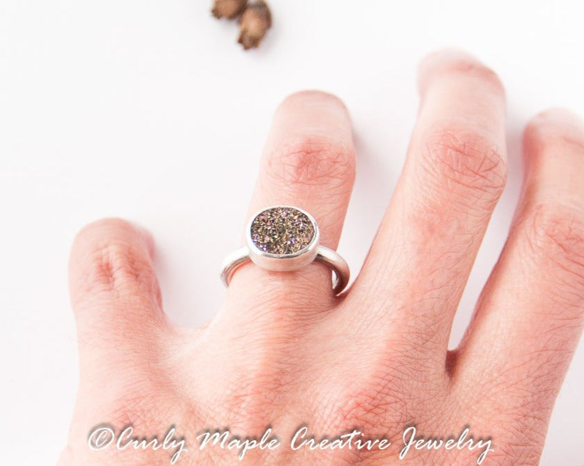 Minimalist Druzy Silver Ring on a woman's left hand  ring finger