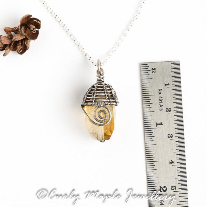 Wire Wraped Citrine Pendant with a ruler for scale